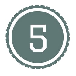 A WheelPad-Teal circle that has the resemblance of a tire, with the number