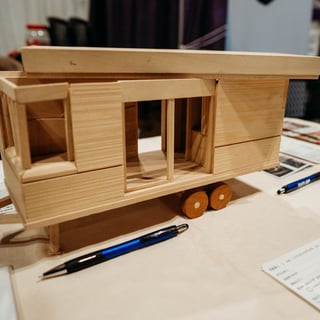 A model of a WheelPad unit displayed on the table at the WheelPad exhibitor booth during the Abilities Expo in Chicago.