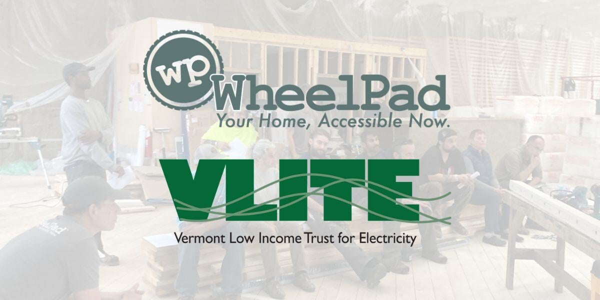 WheelPad L3C Logo, Vermont Low Income Trust for Electricity (VLITE) Logo. Logos overlayed on a semi-translucent image of the WheelPad team sitting in the manufacturing facility together.